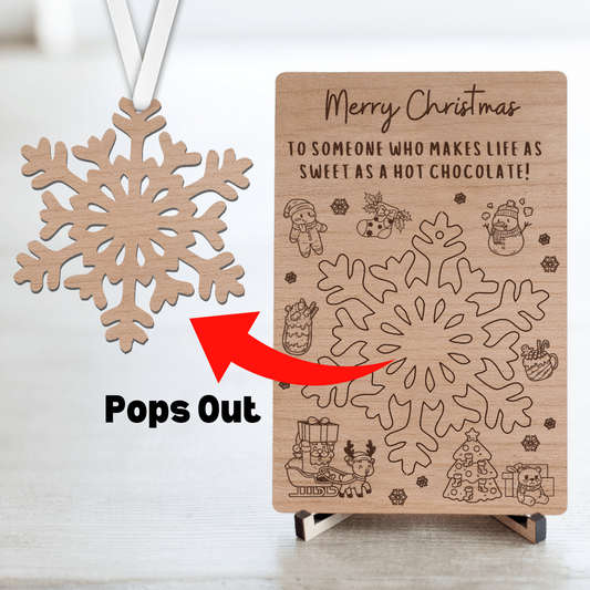 Laser-cut cherry wood postcard with pop-out ornament, a unique and heartfelt way to send a message. Crafted from premium wood, each postcard includes a detachable ornament that recipients can cherish long after the occasion. Perfect for holidays, birthdays, or special moments, this keepsake combines the elegance of wood with thoughtful design. Wishing everyone a Merry Christmas!